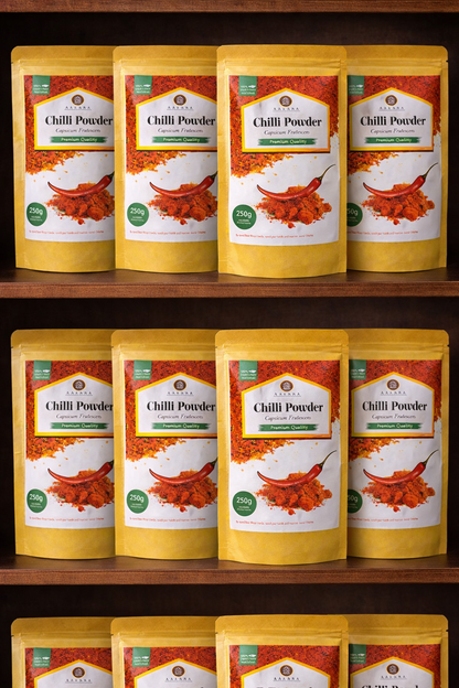 Multiple bags of chili powder on a wooden shelf