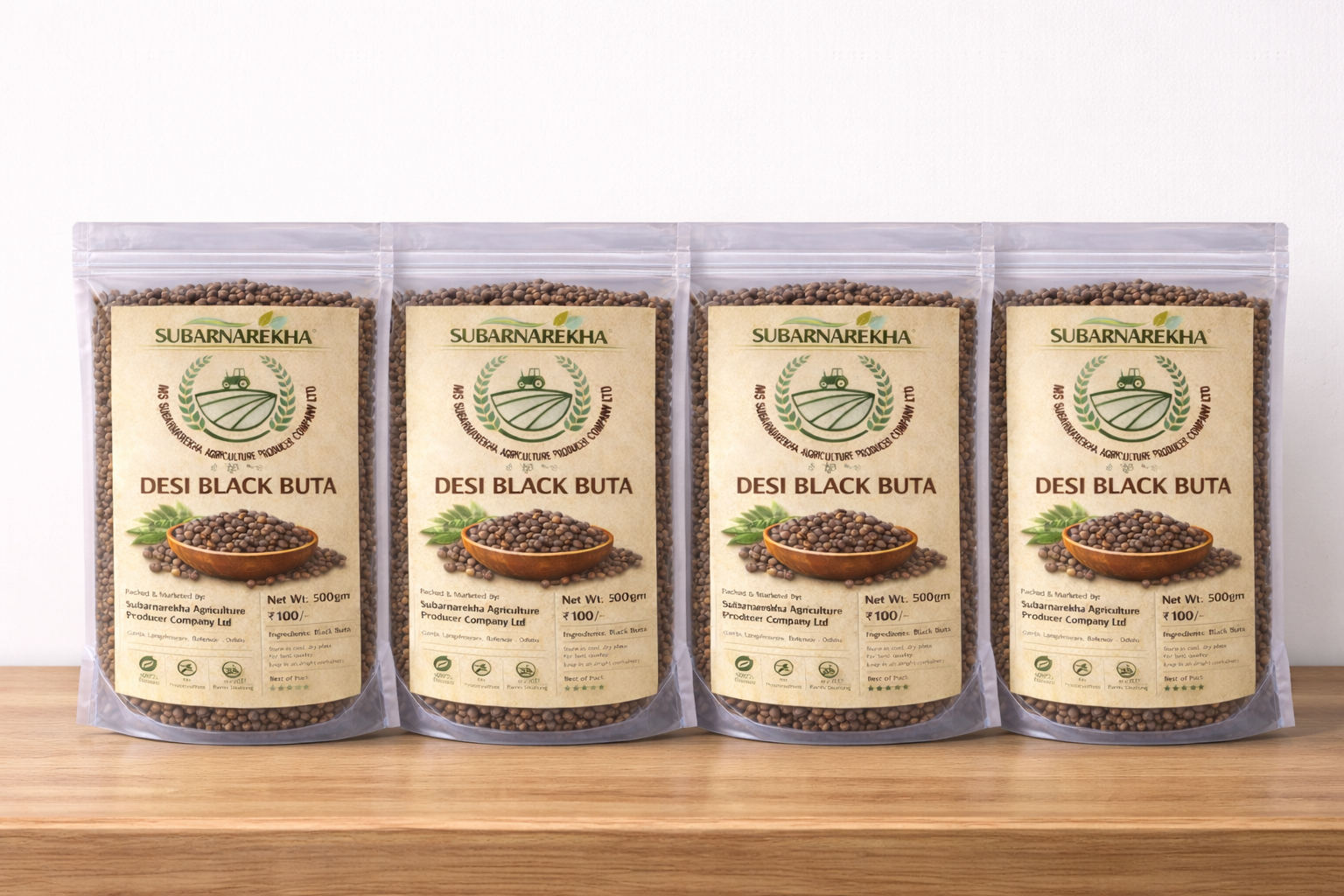 Four packages of Subarnarekha Desi Black Buta on a wooden surface with a white background