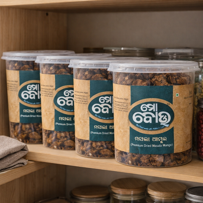 Jars of dried mangoes on a wooden shelf with visible labels.