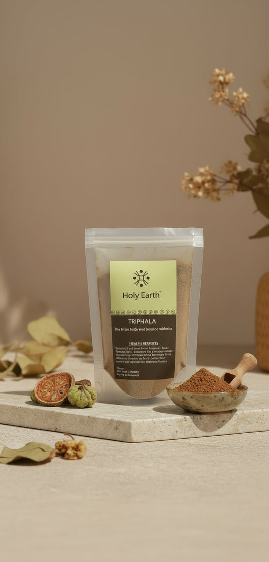 Packaged product from Holy Earth on a neutral background with dried plants.