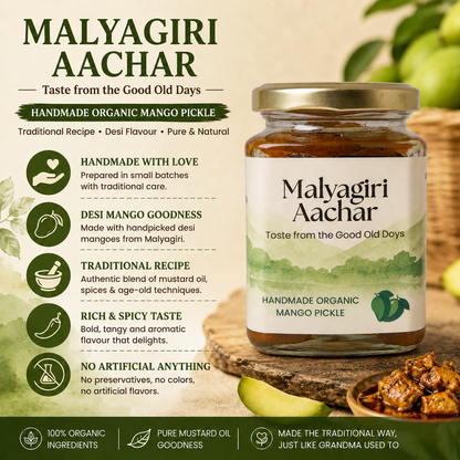 Malyagiri Aachar jar with product details on a wooden board with mangoes in the background