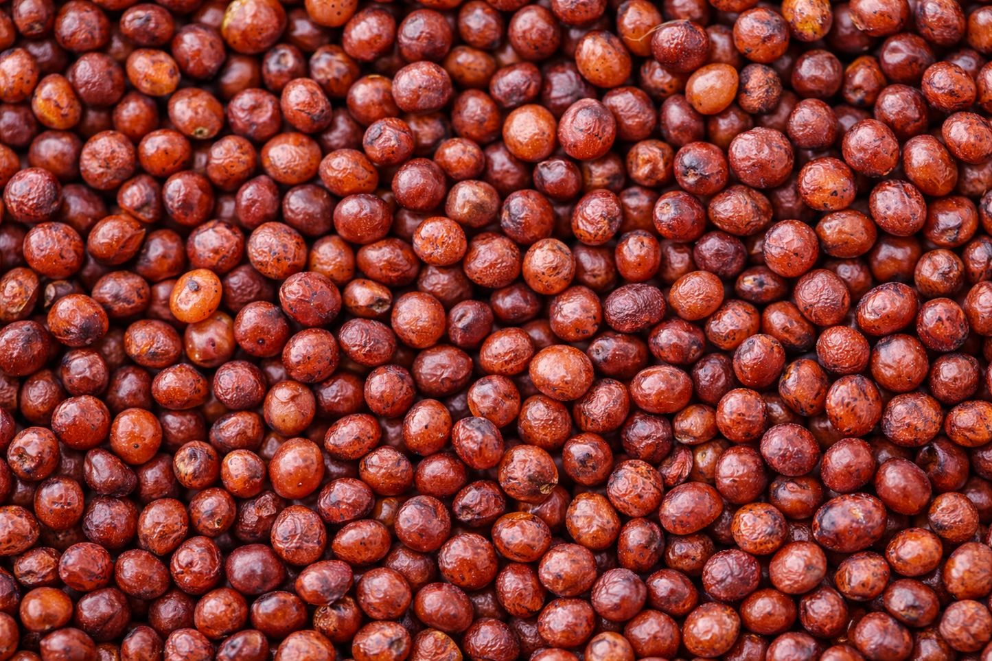 Close-up of red lentils with a textured pattern