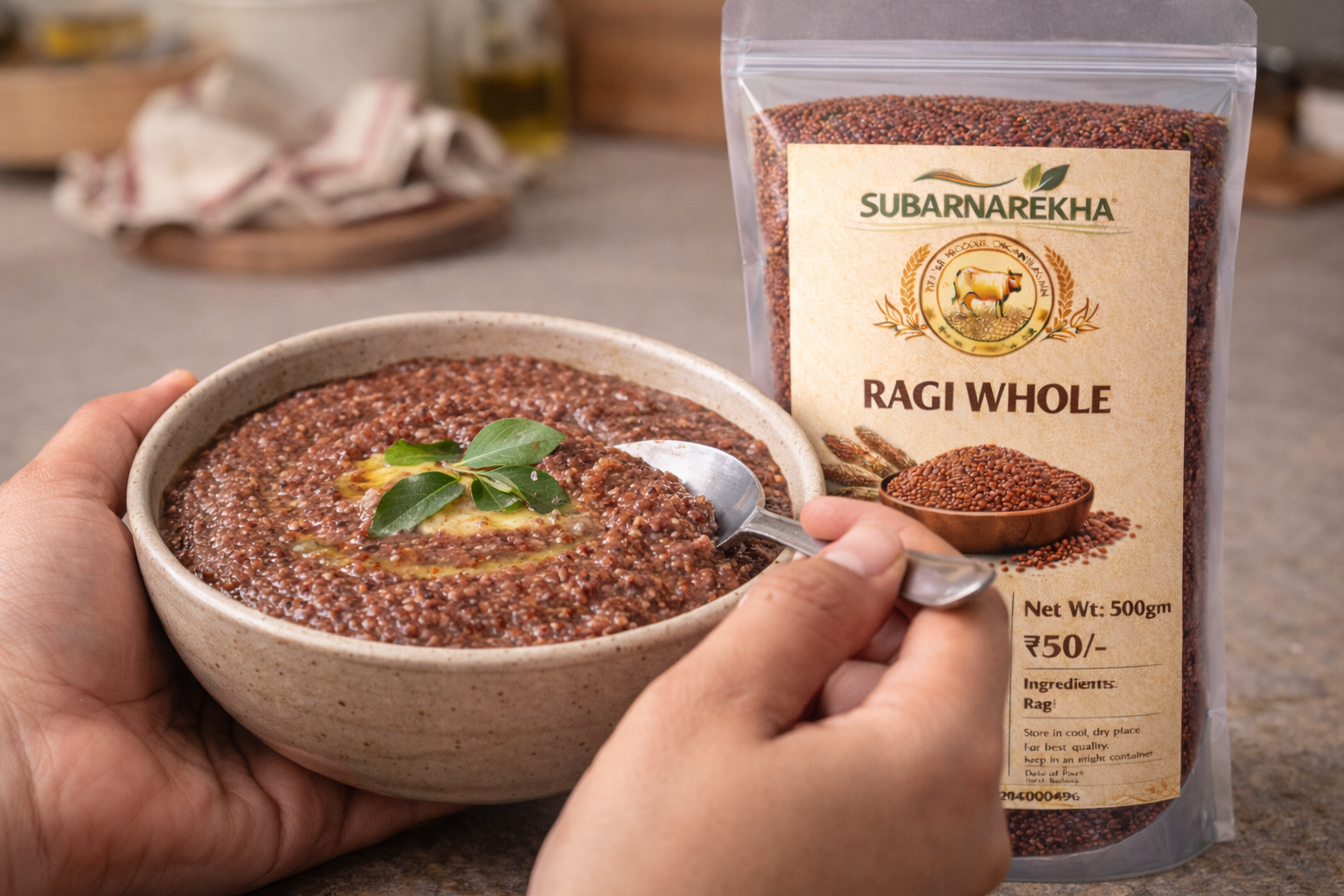 Bowl of ragi porridge with a spoon and Subarnarekha Ragi Whole package on a table.