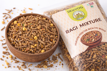 Ragi mixture in a wooden bowl with a package labeled 'Desivog Ragi Mixture' on a white background.