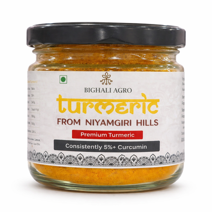 Jar of turmeric from Niyamgiri Hills with Bighali Agro branding on a white background