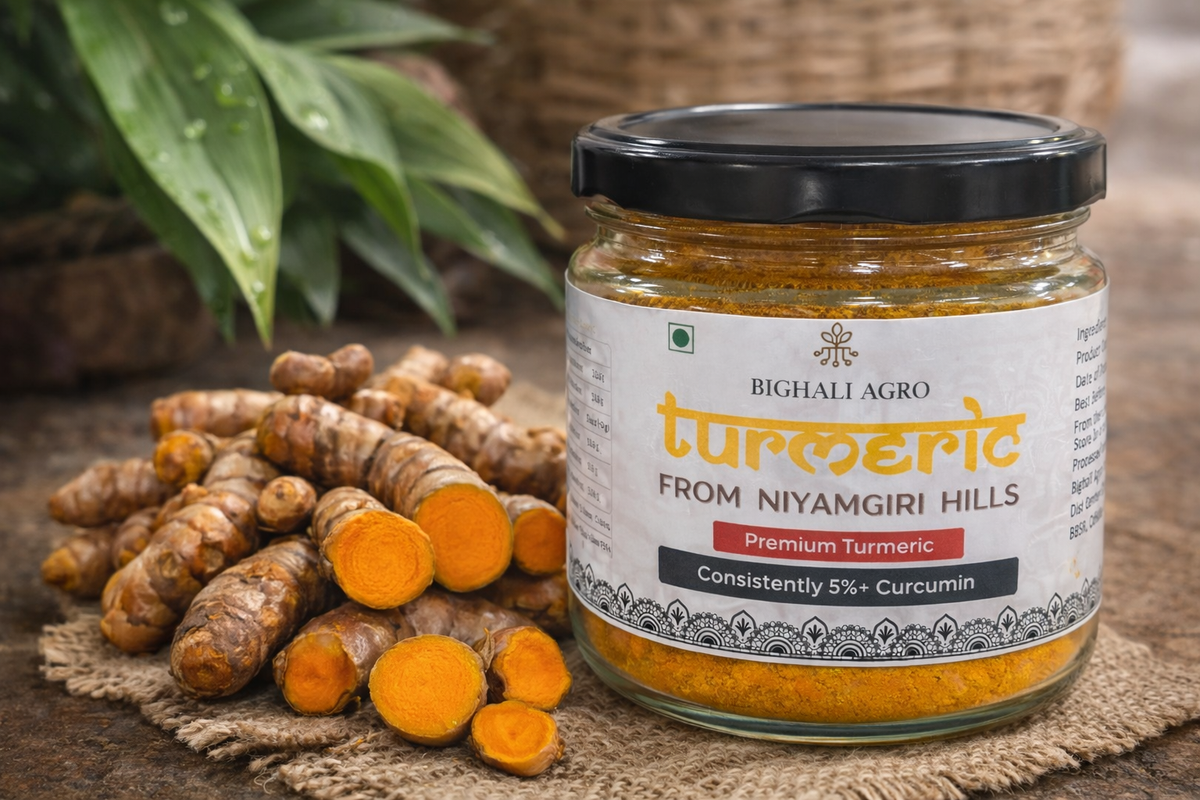Jar of turmeric with fresh turmeric roots on a wooden surface