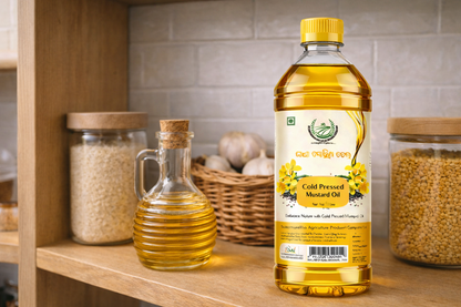 Bottle of cold pressed mustard oil on a kitchen shelf with jars and a basket.