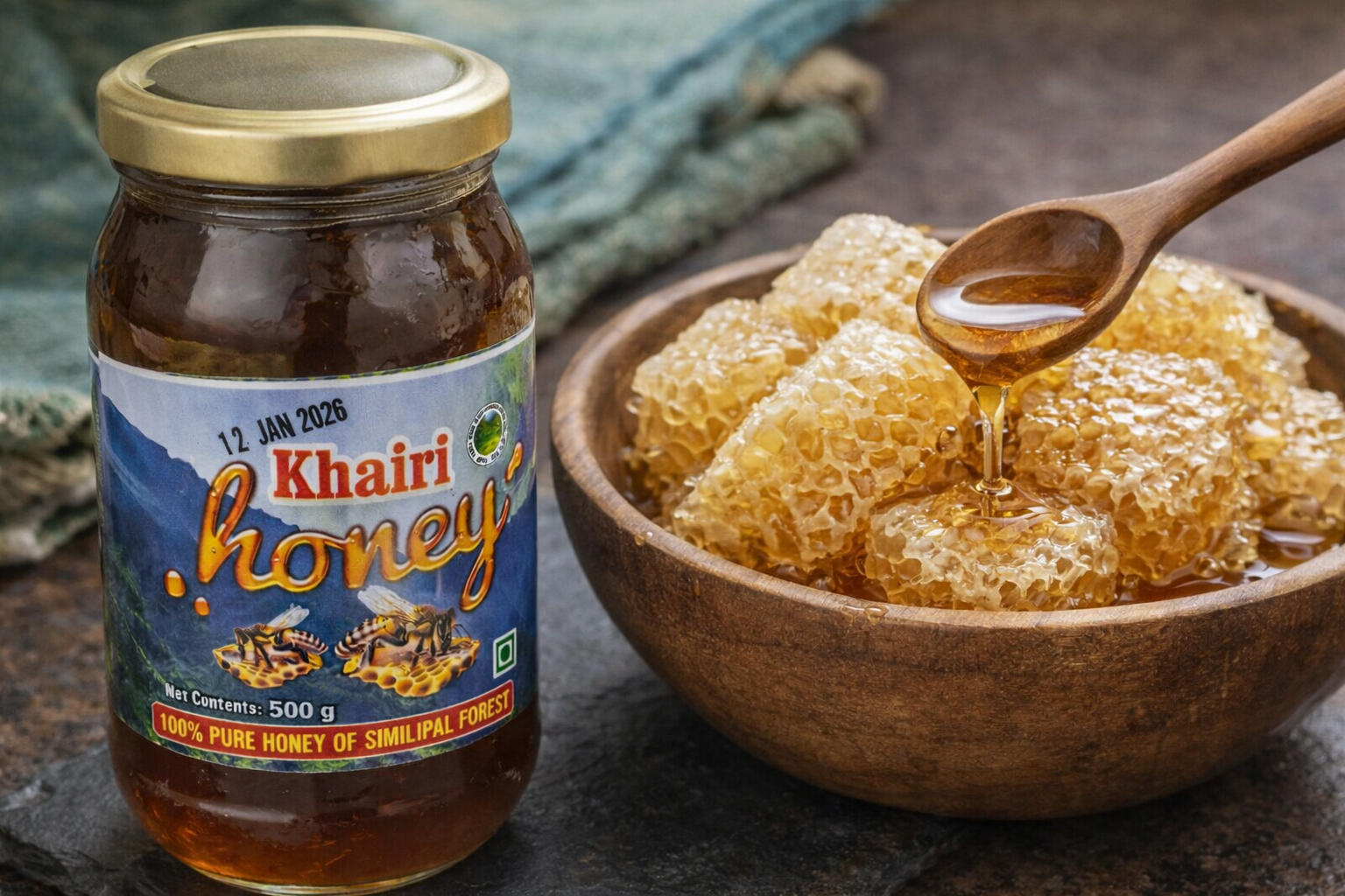 Jar of Khairi honey with a wooden spoon on honeycomb