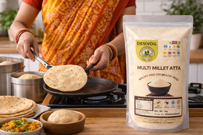 Person cooking flatbread with a package of DESIVOG Multi Millet Atta in the foreground.